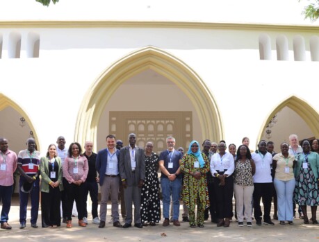 Participants gathered outside a historic building during the Malindi regional workshop in Kenya, emphasizing regional cooperation. Group photo at Malindi regional workshop, Kenya focusing on community development and collaboration.