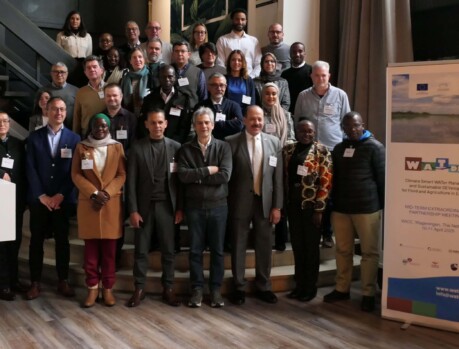 Attendees gathered for a networking session during the Partnership Meeting, focusing on collaboration and strategic growth. Group of professionals at a partnership meeting event.