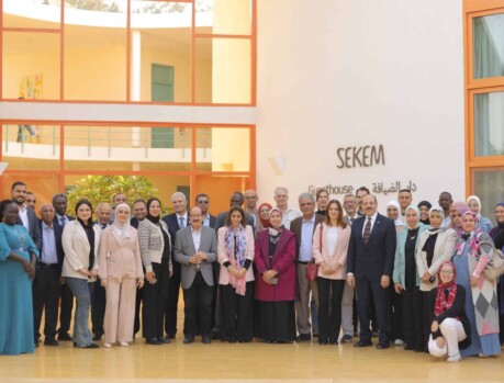 Participants of the regional workshop on BMPs scenarios validation gathered outside the venue for a group photo. Group photo at BMPs validation workshop during regional event.